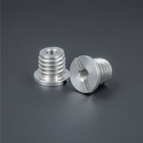 Einschraubmutter Edelstahl M5 zwei Stück auf dunklem Untergrund