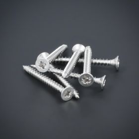 Schraube 3x30 mm Edelstahl V2A - A2 Senkkopf verstärkter Kopf | Kreuz größere Stückzahl auf dunklem Untergrund